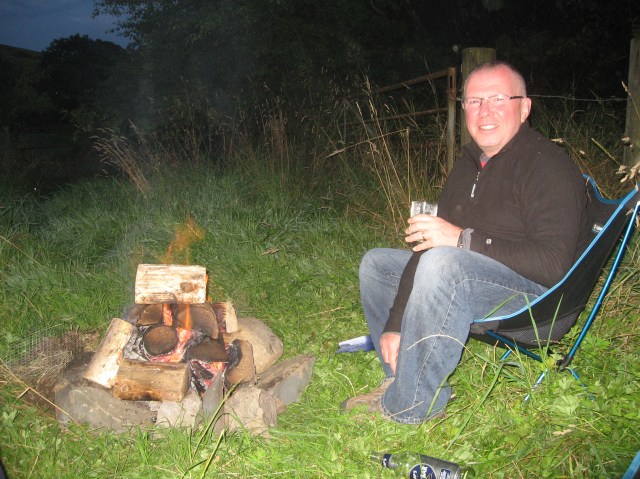 A drink and a fire at the end of the day